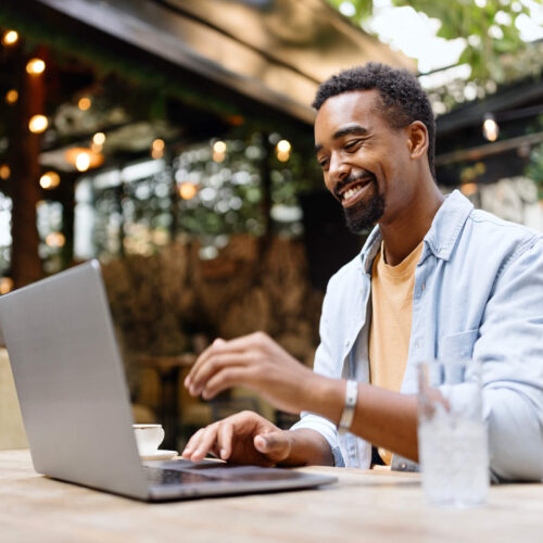 man going online to request tax transcript